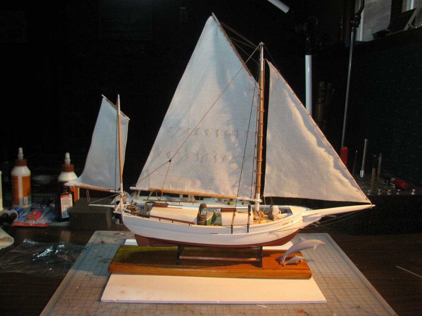 A model of a sail boat on display.